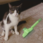 Demonstration of one-click self-cleaning button on pet brush