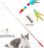 Close up of YULOYI cat teaser wand handle and colorful feather attachments with small bells