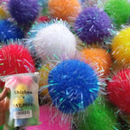 Shizhoo sparkle pom pom balls for cat front view containing thirty colorful glitter pieces.