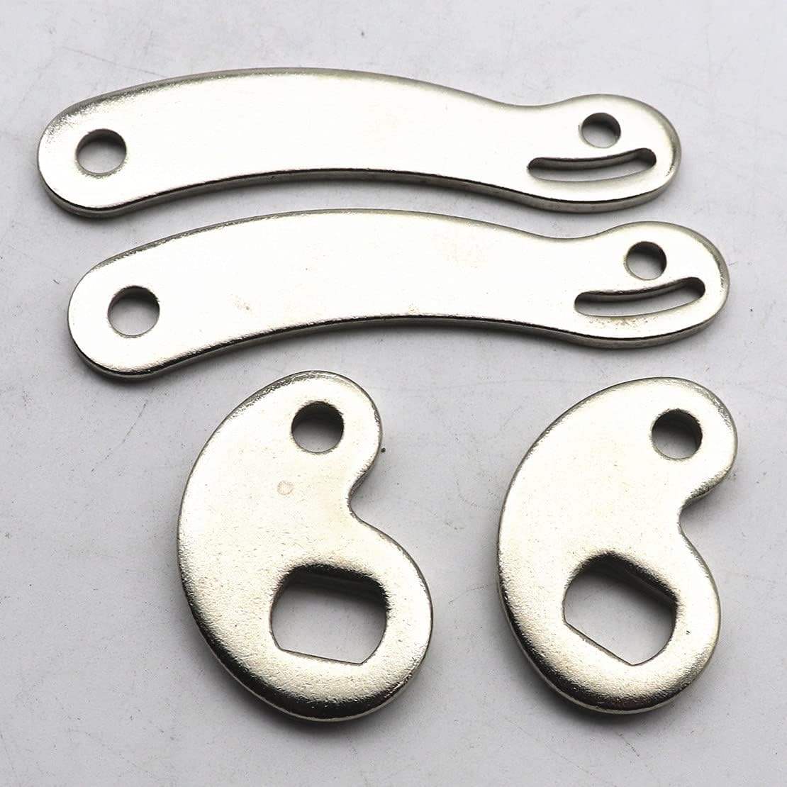 Industrial grade worm gear hose clamps laid out on a clean background.