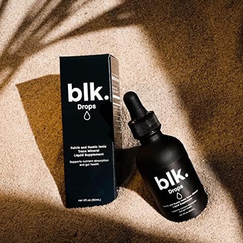 Back label of blk. trace mineral drops displaying USA manufacturing details and directions for use.