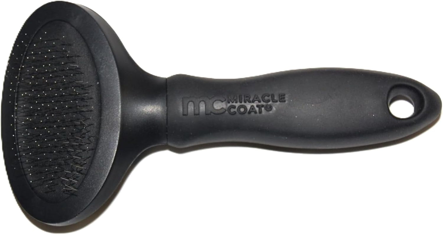 Miracle Care pet grooming brush side profile detailing the plastic and sanoprene handle grip.
