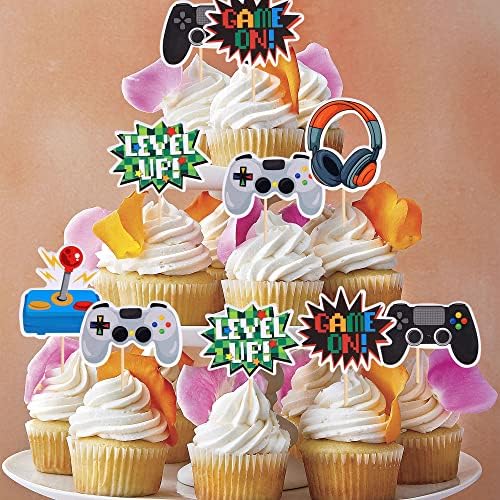 Assembled video game cake decorations on chocolate cupcakes