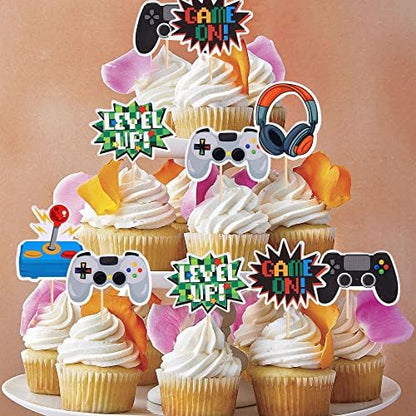 Assembled video game cake decorations on chocolate cupcakes