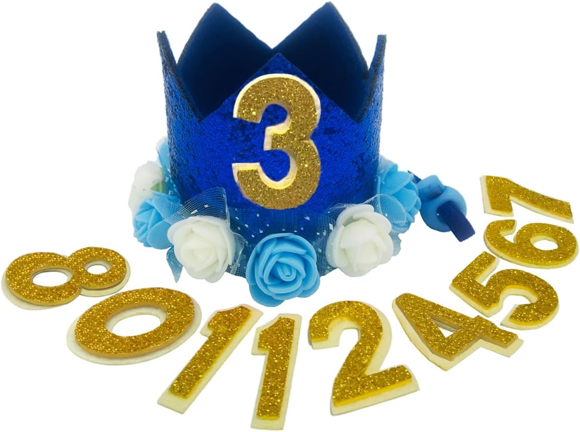 Small puppy wearing gold birthday hat for celebration photo