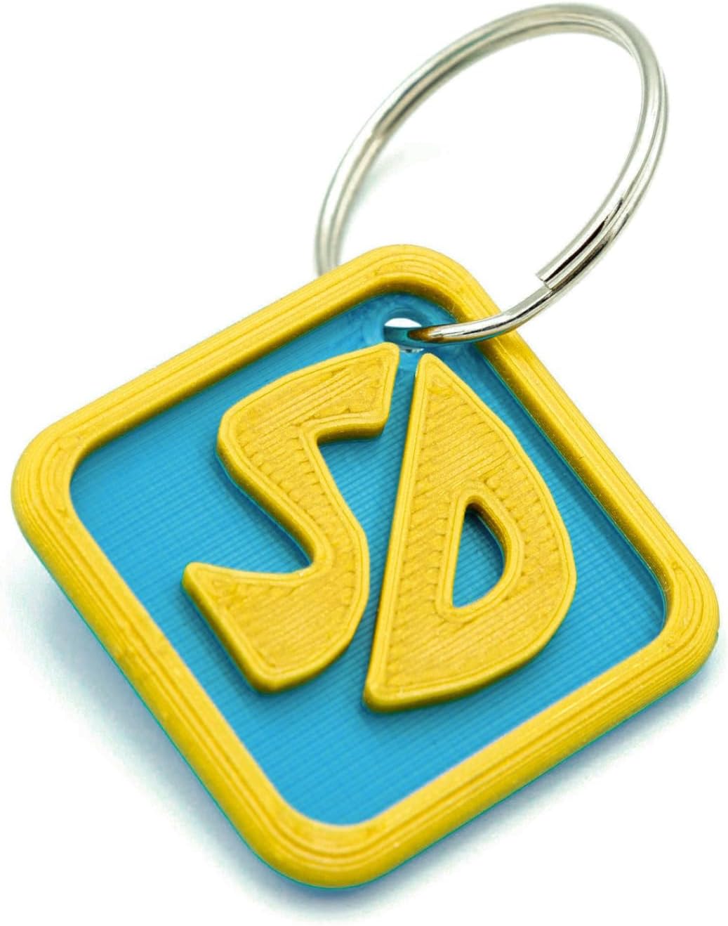 REPLICA3D custom 3D printed plastic Scrappy Doo style pet identification tag with metal keyring attachment.