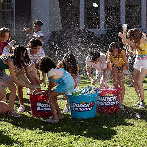 Outdoor summer family activity featuring long range water balloon launcher setup.