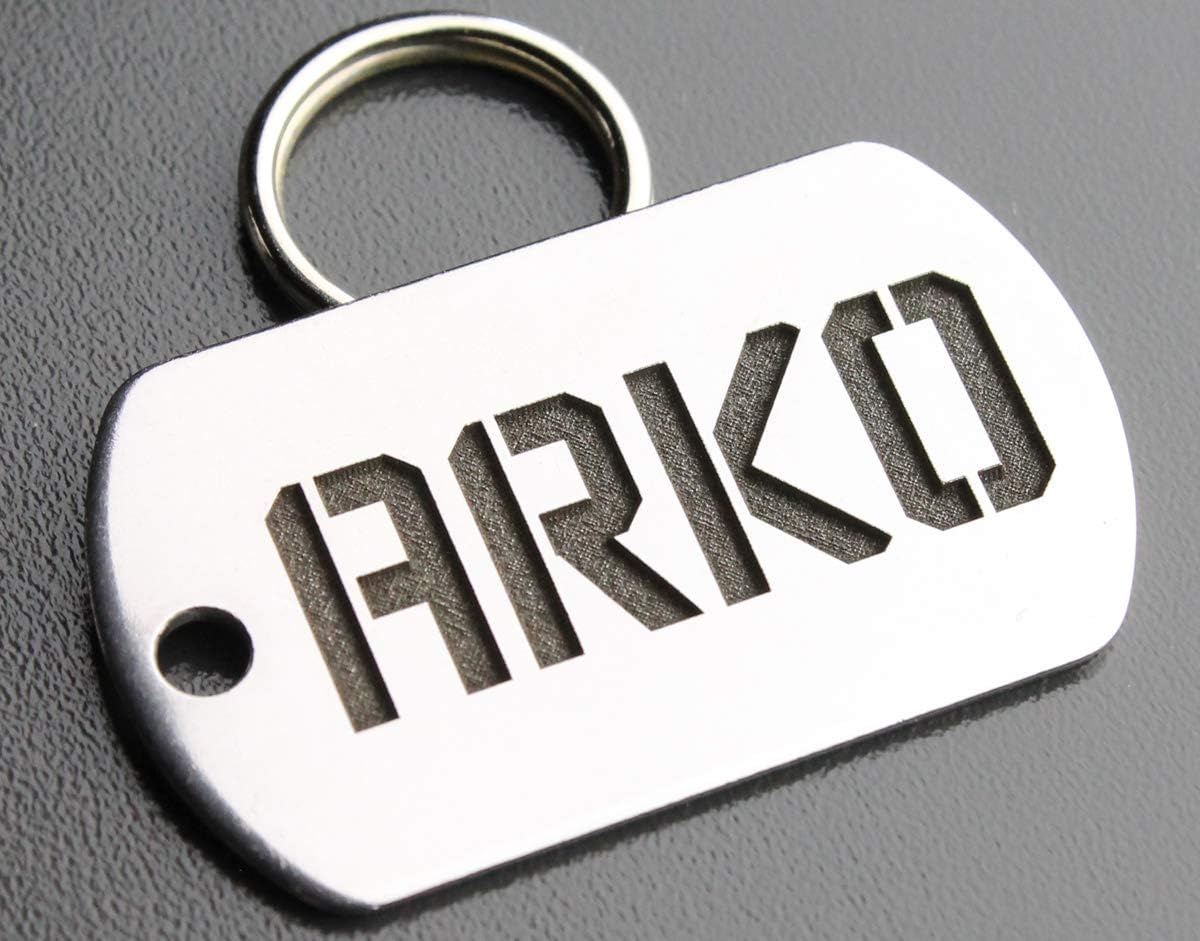 Side angle shot of the scratch resistant Pawsitively Pet Tags premium deep cut bone shape identifier highlighting metal thickness.