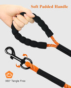 Taglory orange long dog training leash laid out fully on grass.