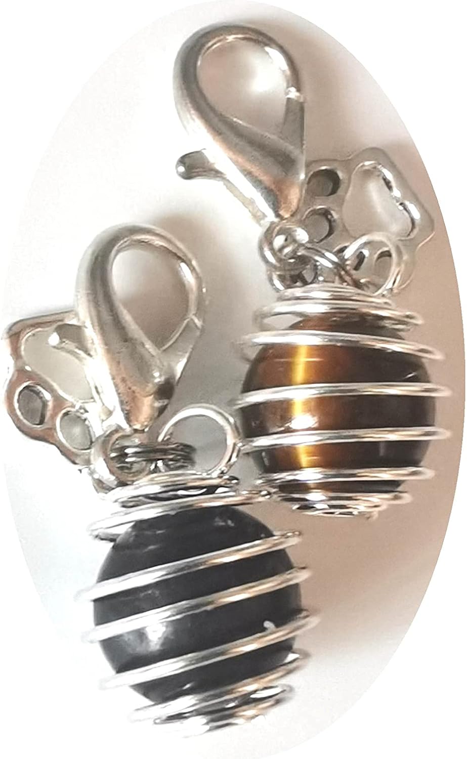 DogTrust crystal pet collar charms front view showing silver plated spiral cage with natural tiger eye healing stone