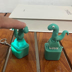 Side view of the portable animal keychain with USB charging port