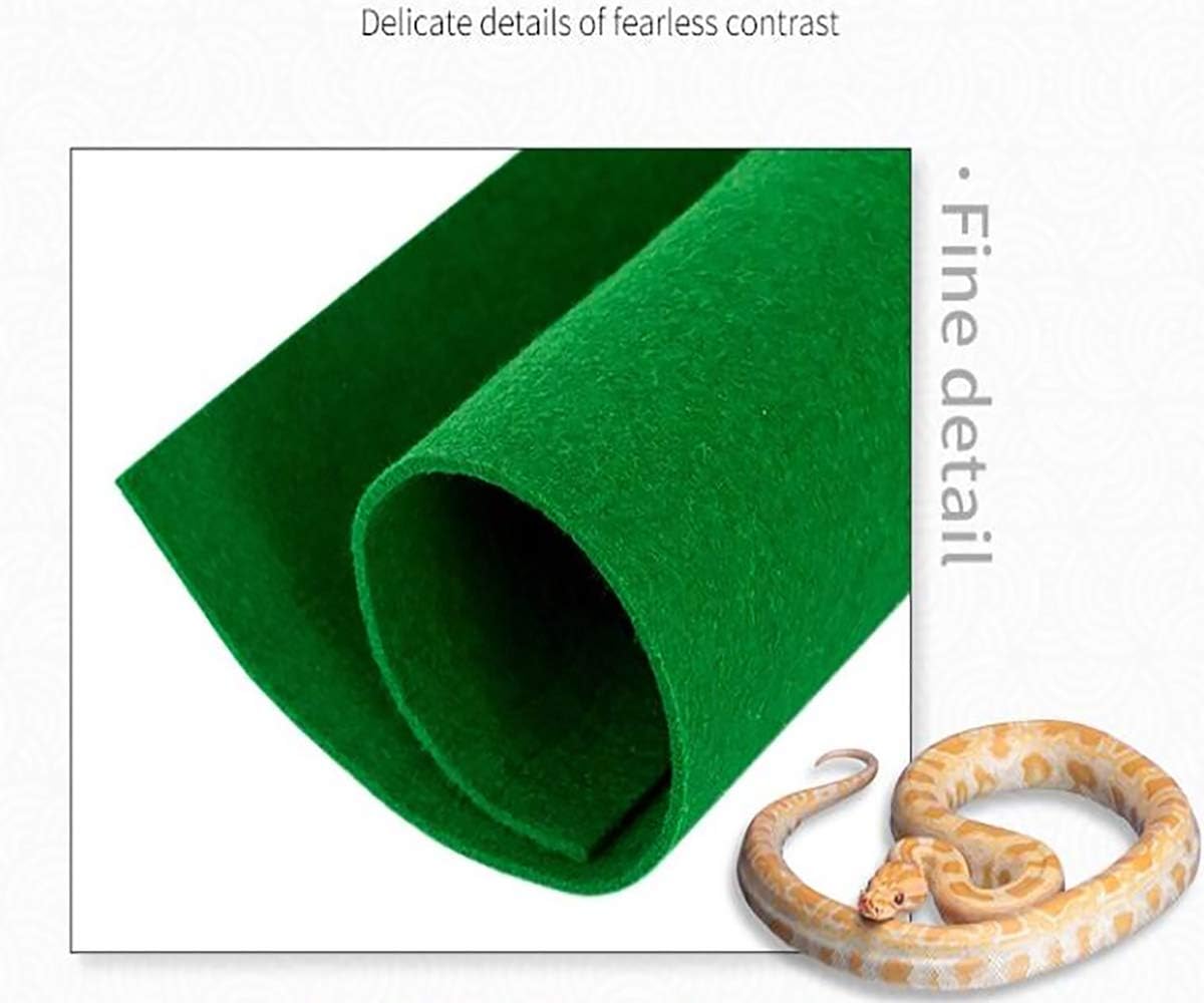 Demonstration of cutting the reptile mat with scissors to fit custom tank sizes
