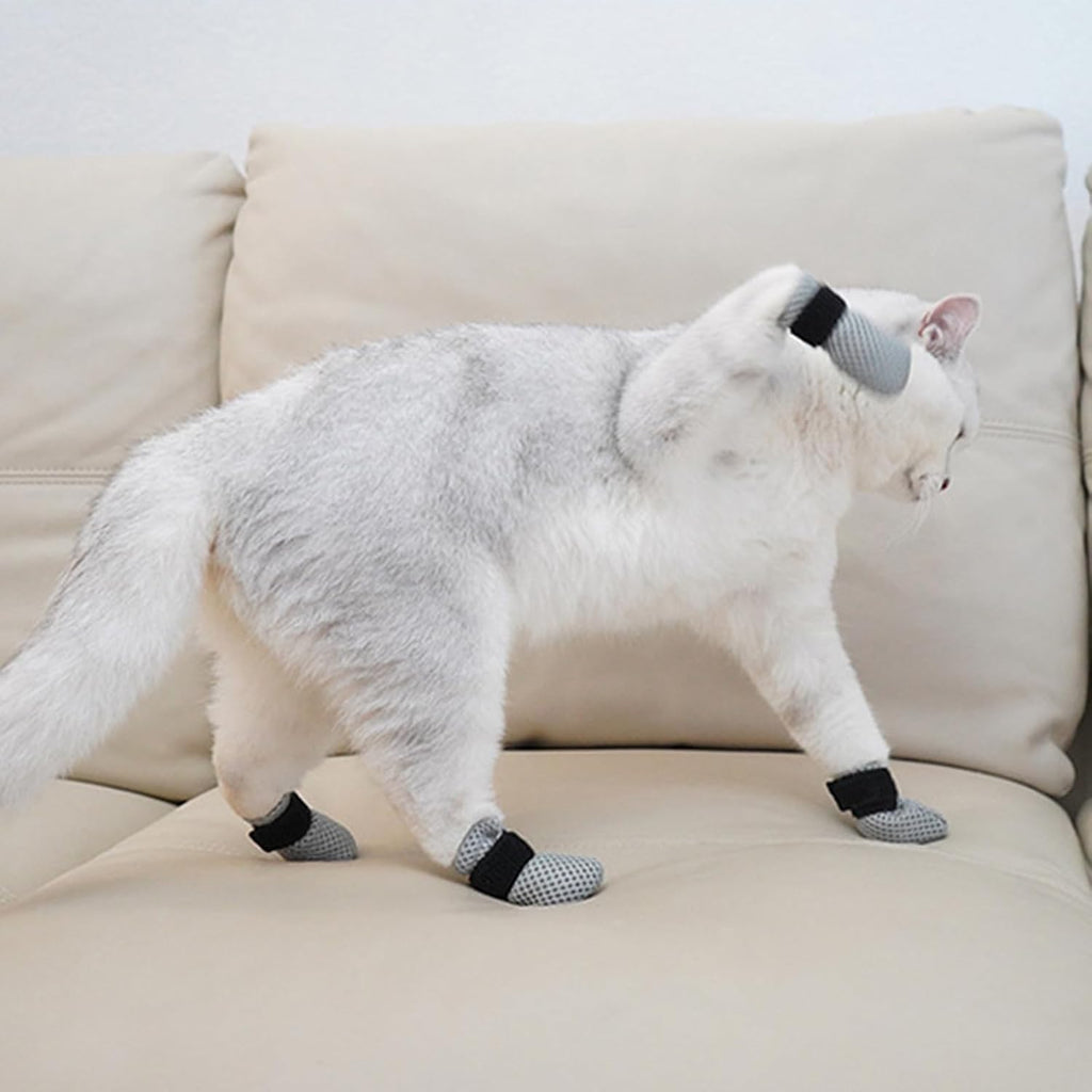 Medium size black dog and cat foot covers for safe grooming.