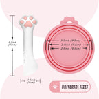 Side profile of paw shaped spatula scraping a can