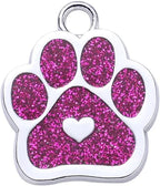 Close up of custom laser text engraving on metal pet tag.
