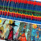 Overhead view of a spread of several borderless graffiti tarot cards showing colorful archetypes and rounded corners.