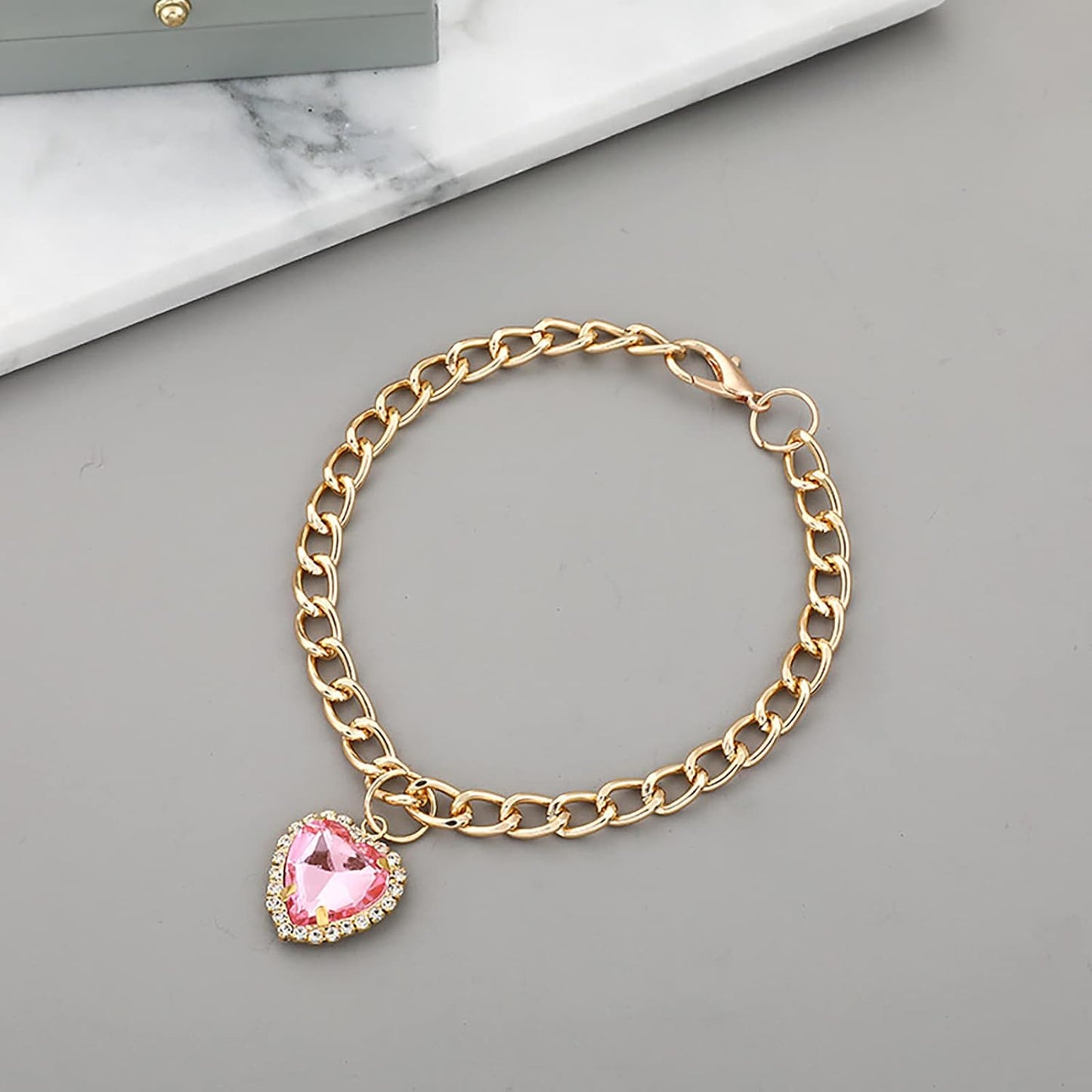 Adjustable metal pet jewelry collar displaying the secure snap closure system