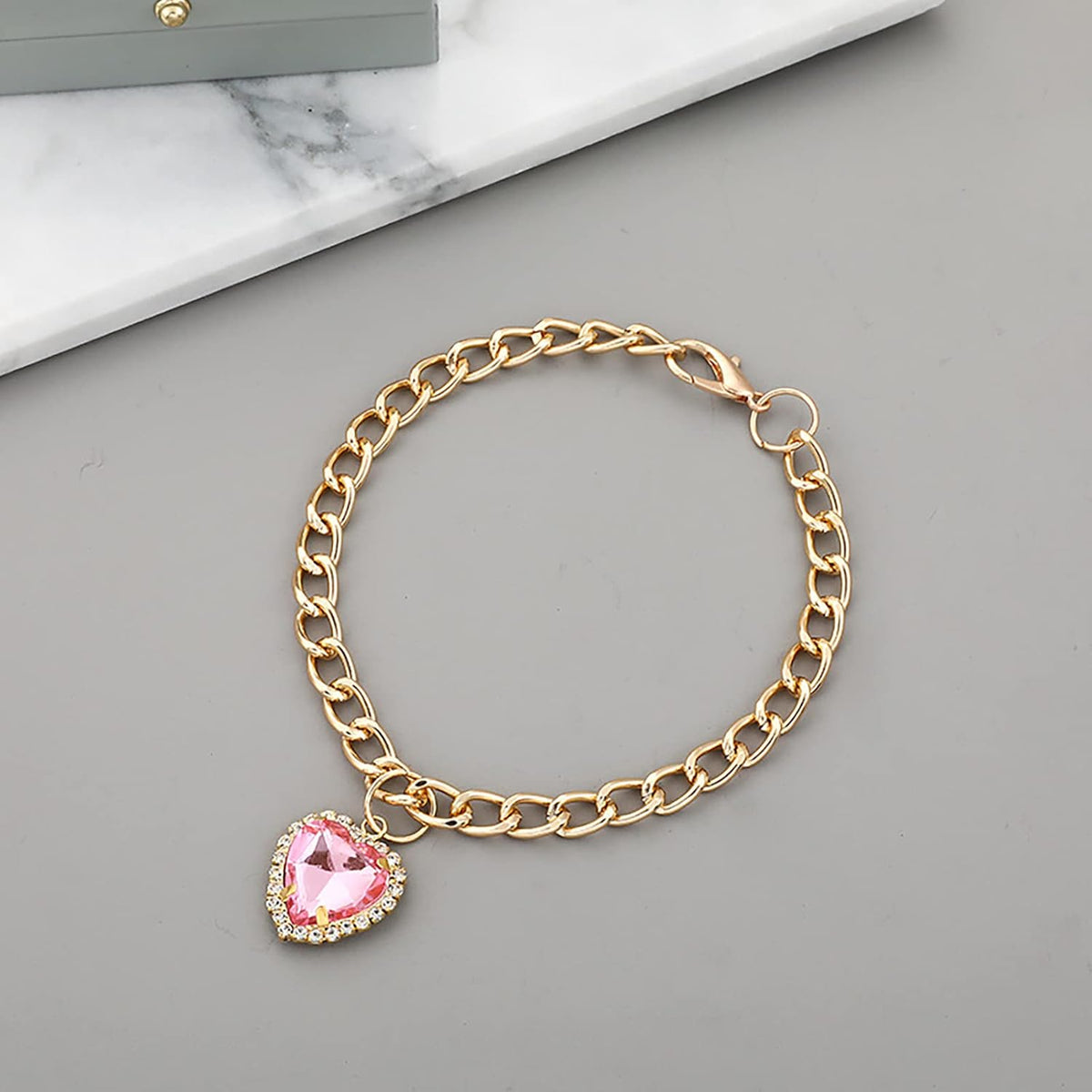 Adjustable metal pet jewelry collar displaying the secure snap closure system