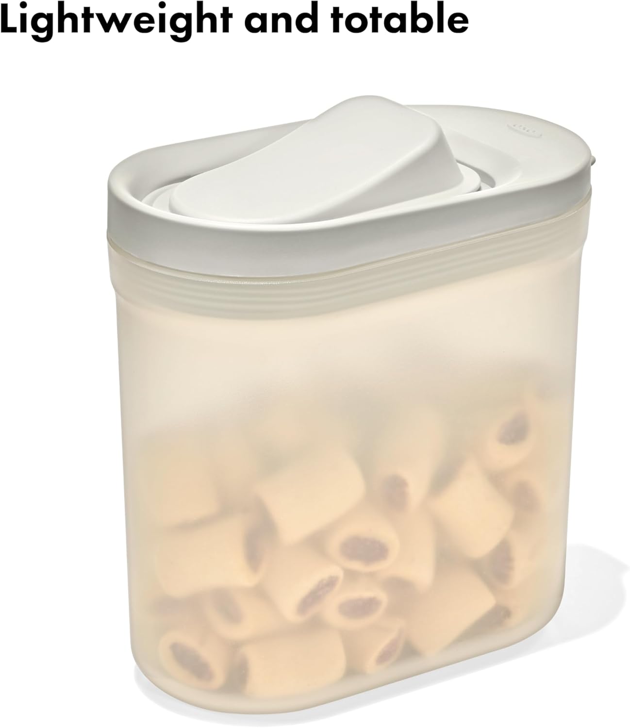 Lifestyle shot of OXO treat container held in hand