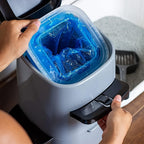 Tear resistant blue plastic litter bag showing the secure bottom knot for odor containment.