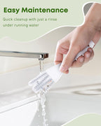 Pawfly bird poop remover tool kit being rinsed clean under running water.