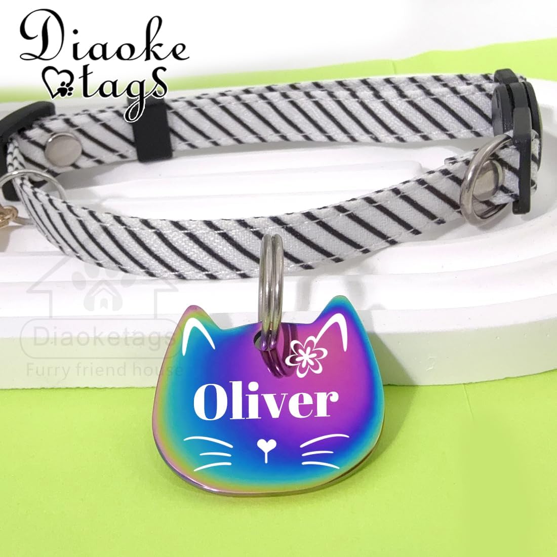 Diaoketags durable metallic pet id tag showing scratch resistant properties on a kitten collar
