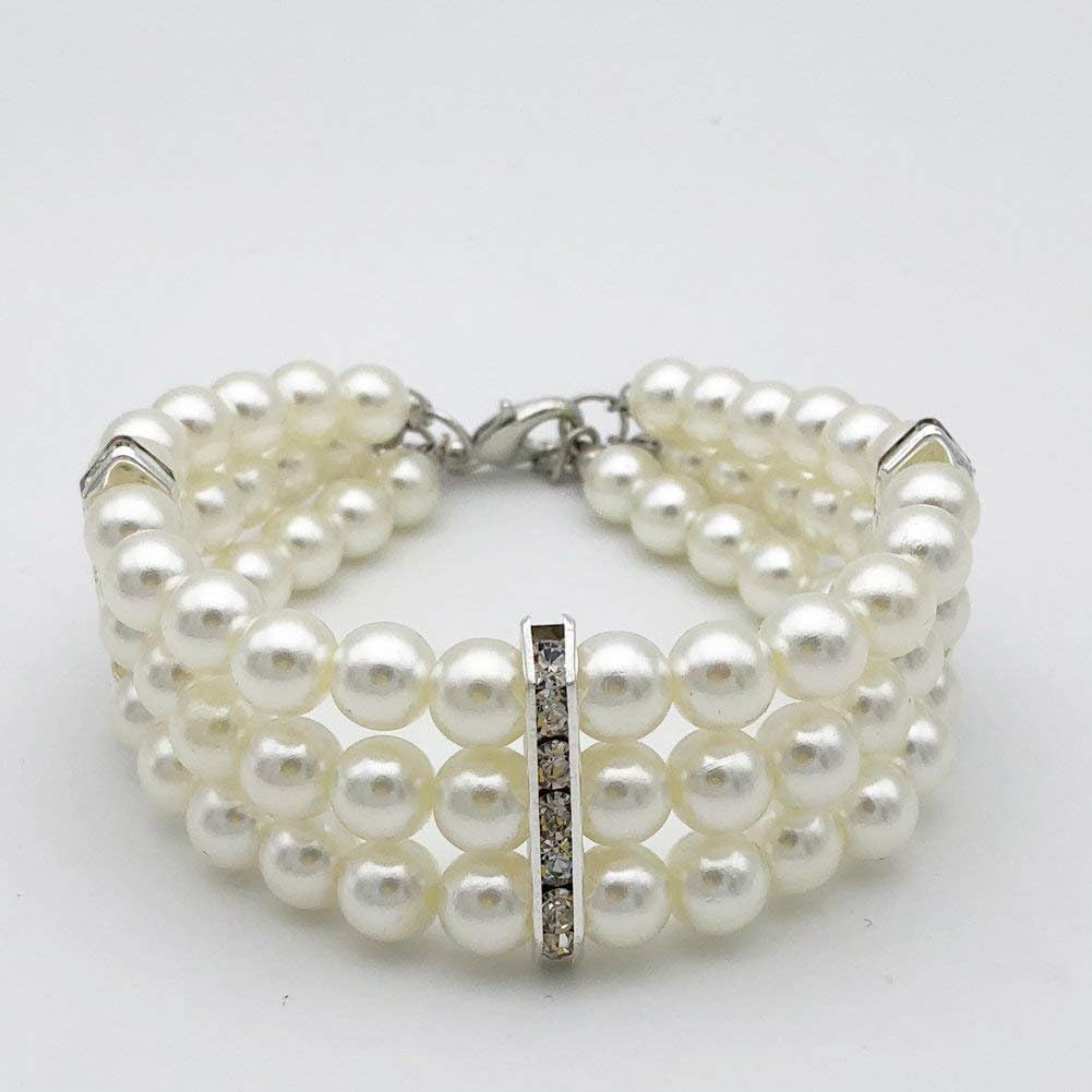 Adjustable purple imitation pearl pet choker with rhinestone heart charm close up view for small dogs