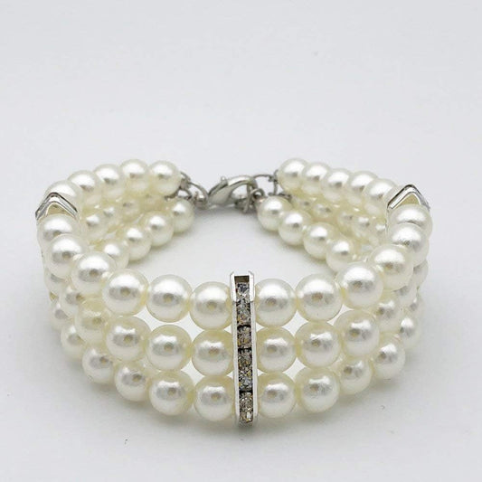 Adjustable purple imitation pearl pet choker with rhinestone heart charm close up view for small dogs