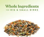 Backyard chickens pecking at garden delight treat mix