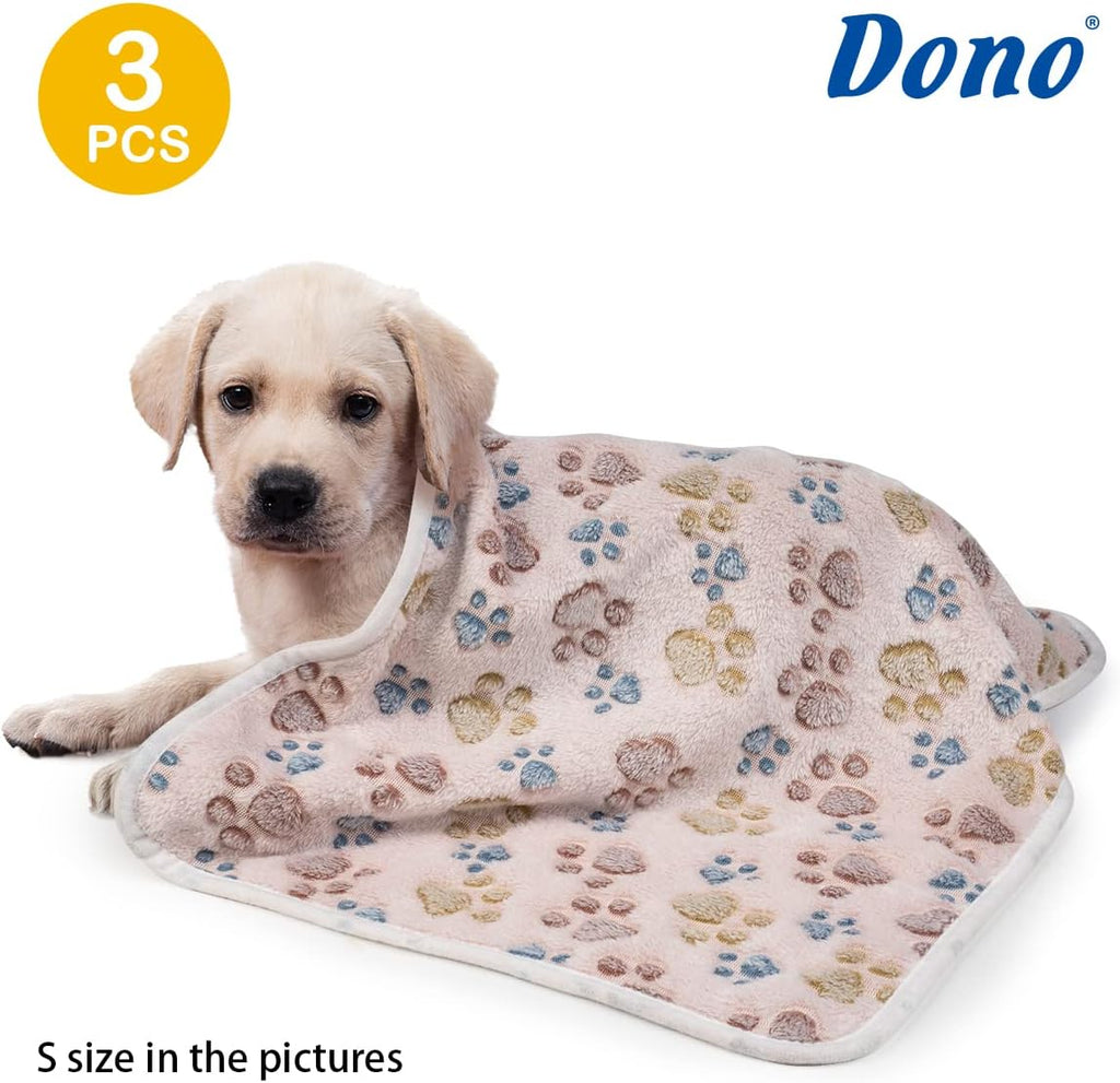 Three pack of Dono puppy and kitten throw blankets in pink, grey, and blue.