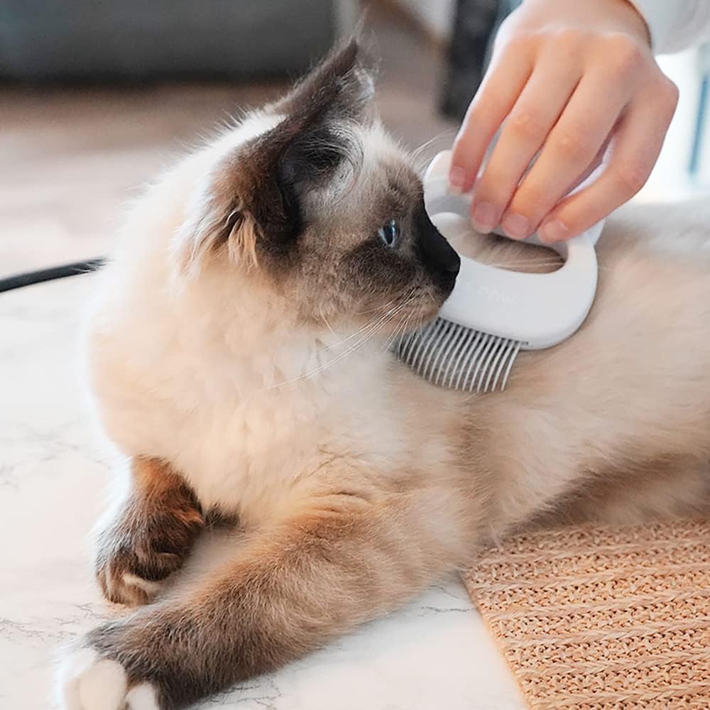 Ergonomic handheld design of the authentic Leo's Paw pet massager.