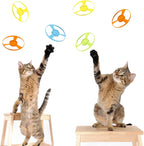 A collection of 15 colorful, bite-resistant replacement propellers spread out next to the interactive cat launcher.