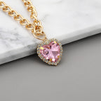 Lightweight sparkling pet costume accessory close up look at the pink gemstone heart