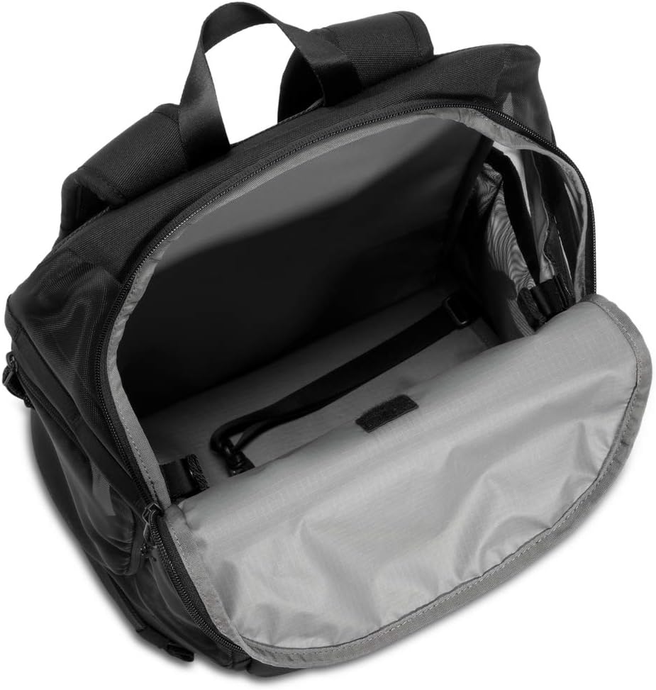 Timbuk2 pet carrier backpack showing side view ventilation mesh panels for dogs and cats