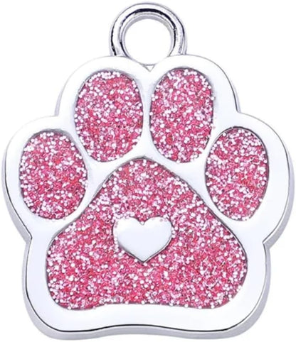 Engraved emergency contact tag with split ring for pet safety.