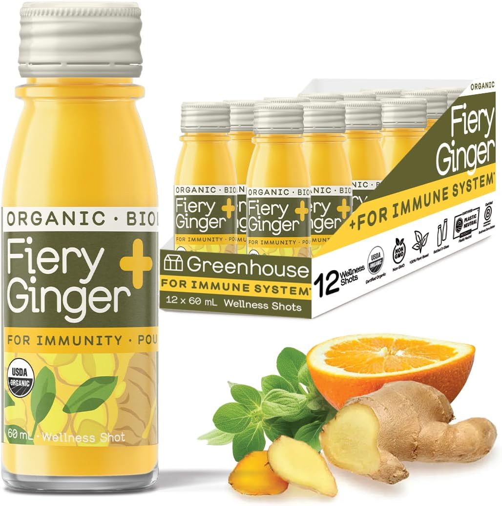 Greenhouse Juice Co Organic Fiery Ginger and Turmeric Wellness Shot twelve pack front view showing premium glass bottles.