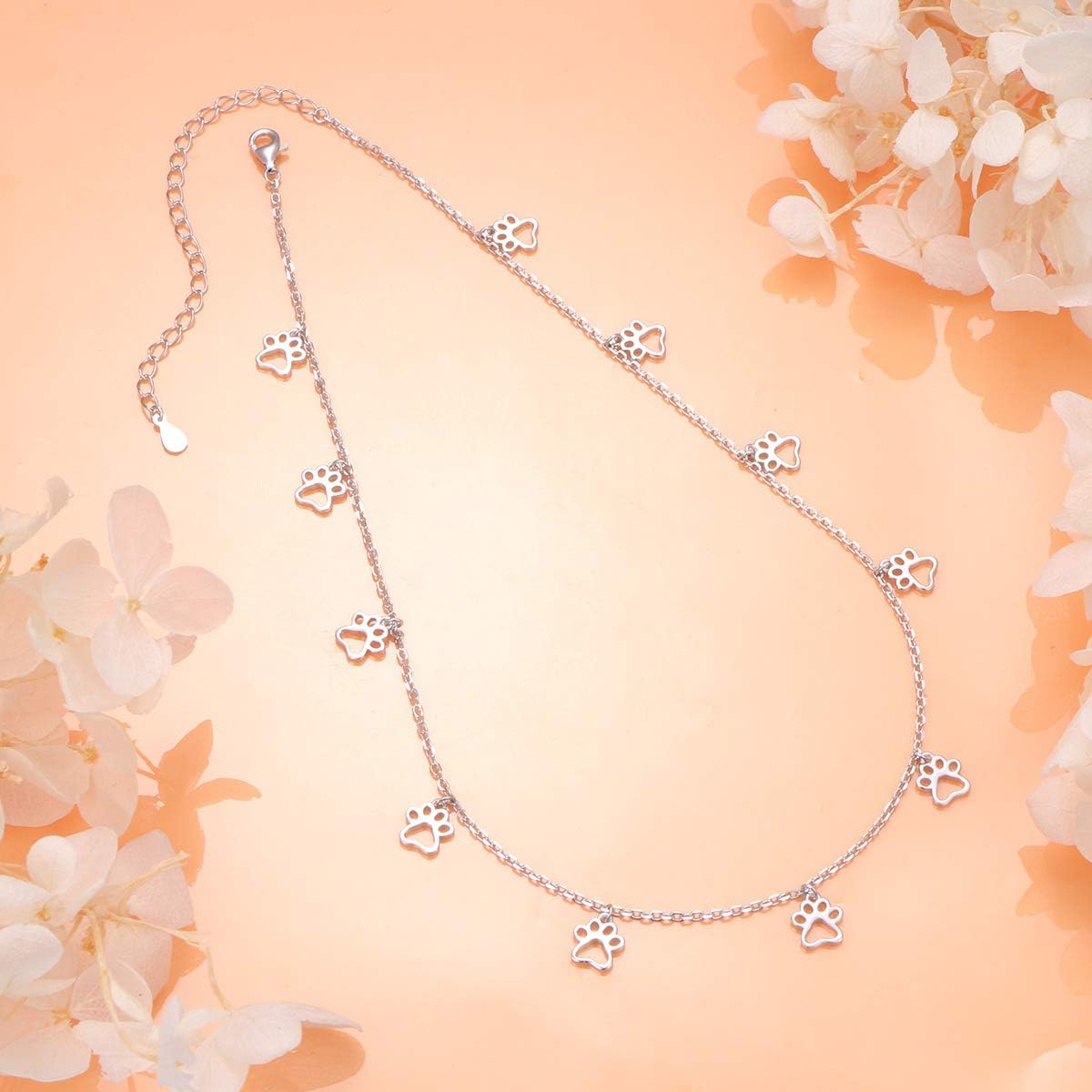 Close up view of the S925 hallmark stamp and the secure lobster claw clasp on the extender chain.