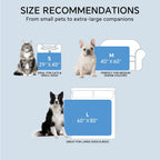 Reversible cooling pet blanket spread out inside a dog crate for hot weather relief.