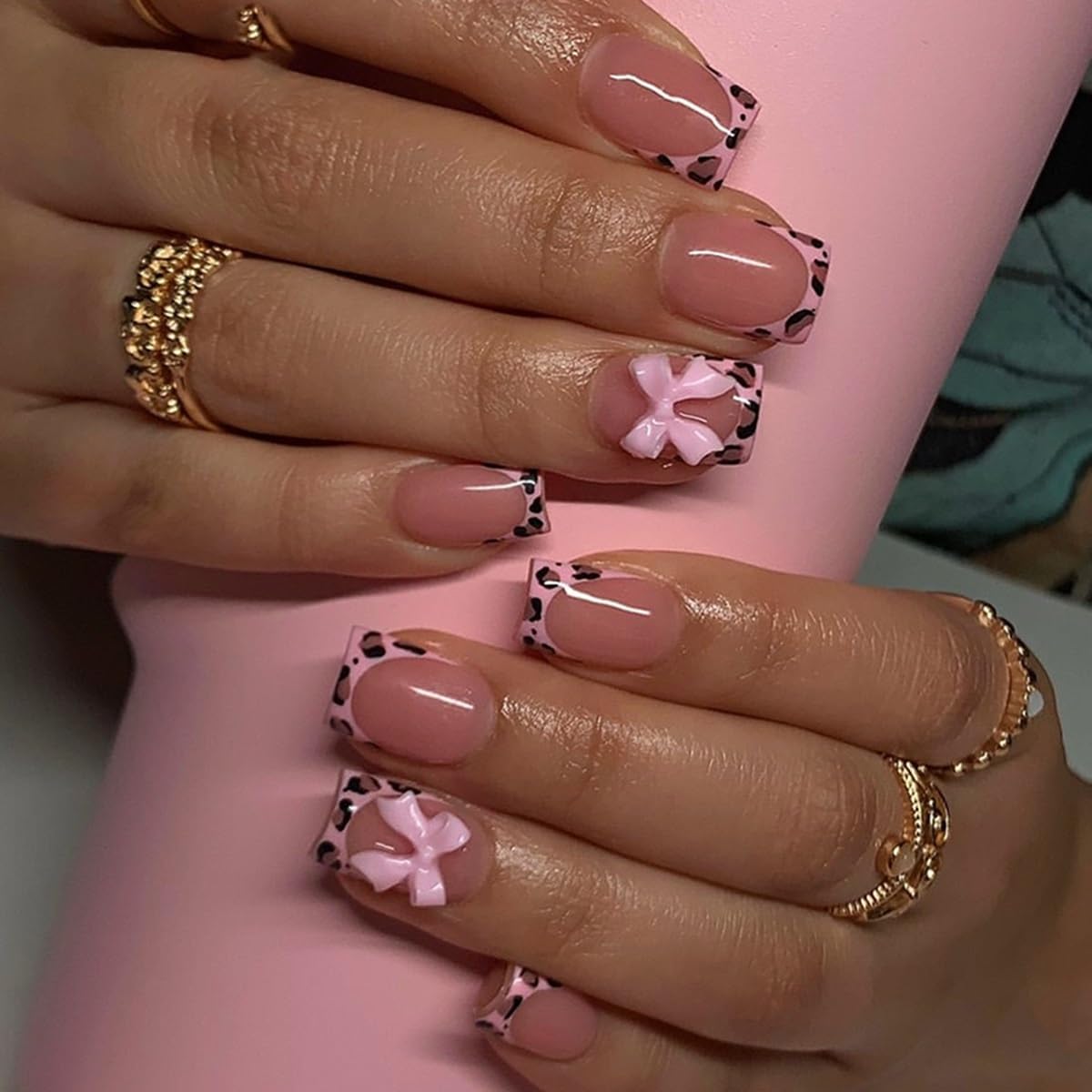 Telain Leopard French Tip Press On Nails front view showcasing bow design