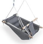 Gladswing canvas baby swing front view showing grey fabric and wooden bars