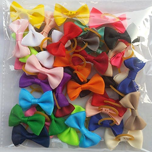 Multiple patterns of puppy grooming bows displayed