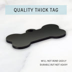 Close up view of customizable black bone shape dog tag with metal attachment ring.