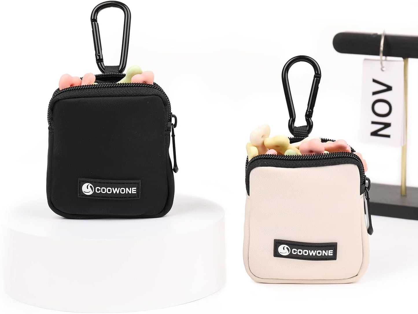 Coowone portable nylon dog walking bag displaying its compact pocket-sized dimensions.