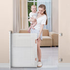 BabyBond retractable baby gate front view installed in a white hallway doorway.