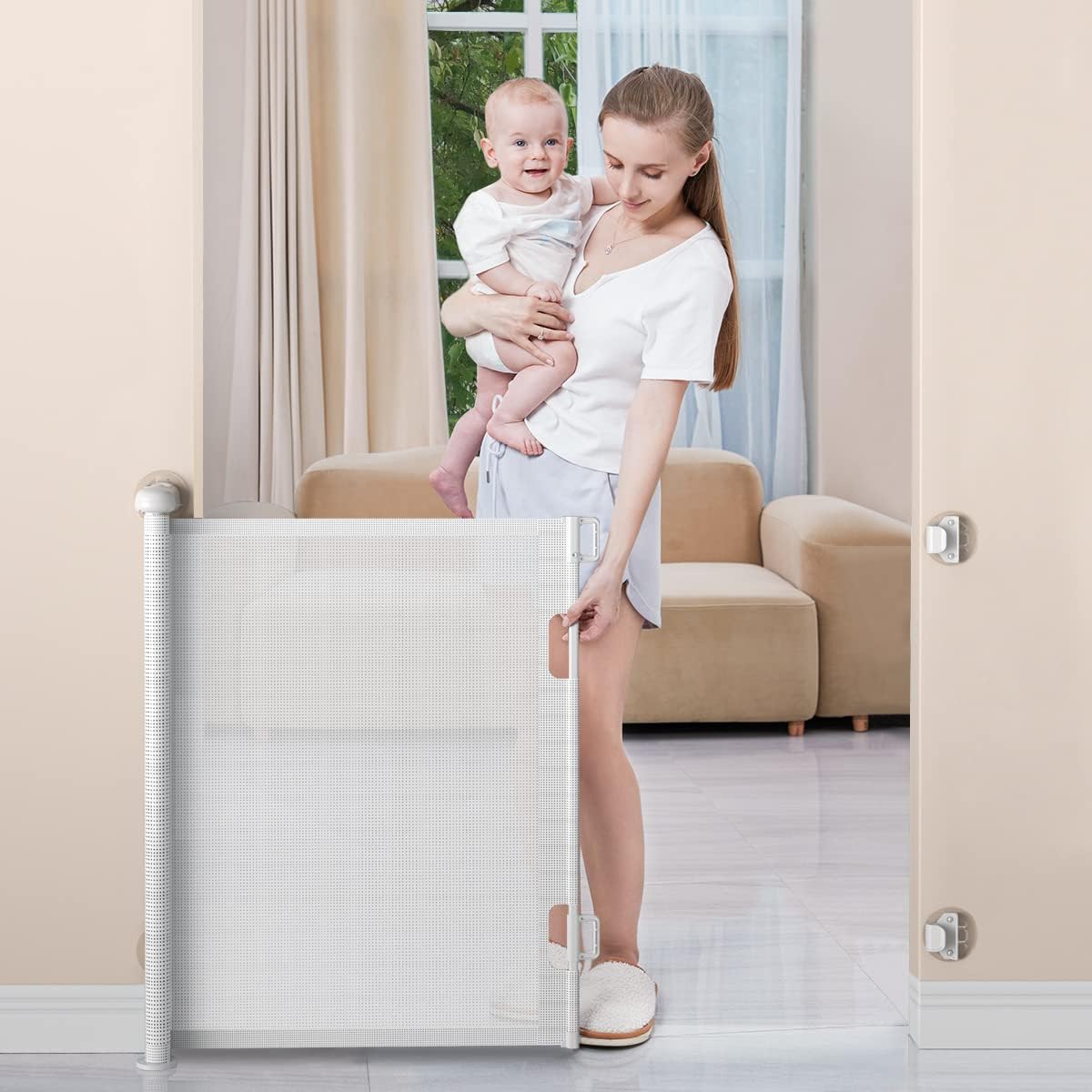 BabyBond retractable baby gate front view installed in a white hallway doorway.