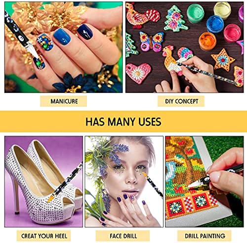 Hand using a wax dotting pen to pick up a crystal rhinestone