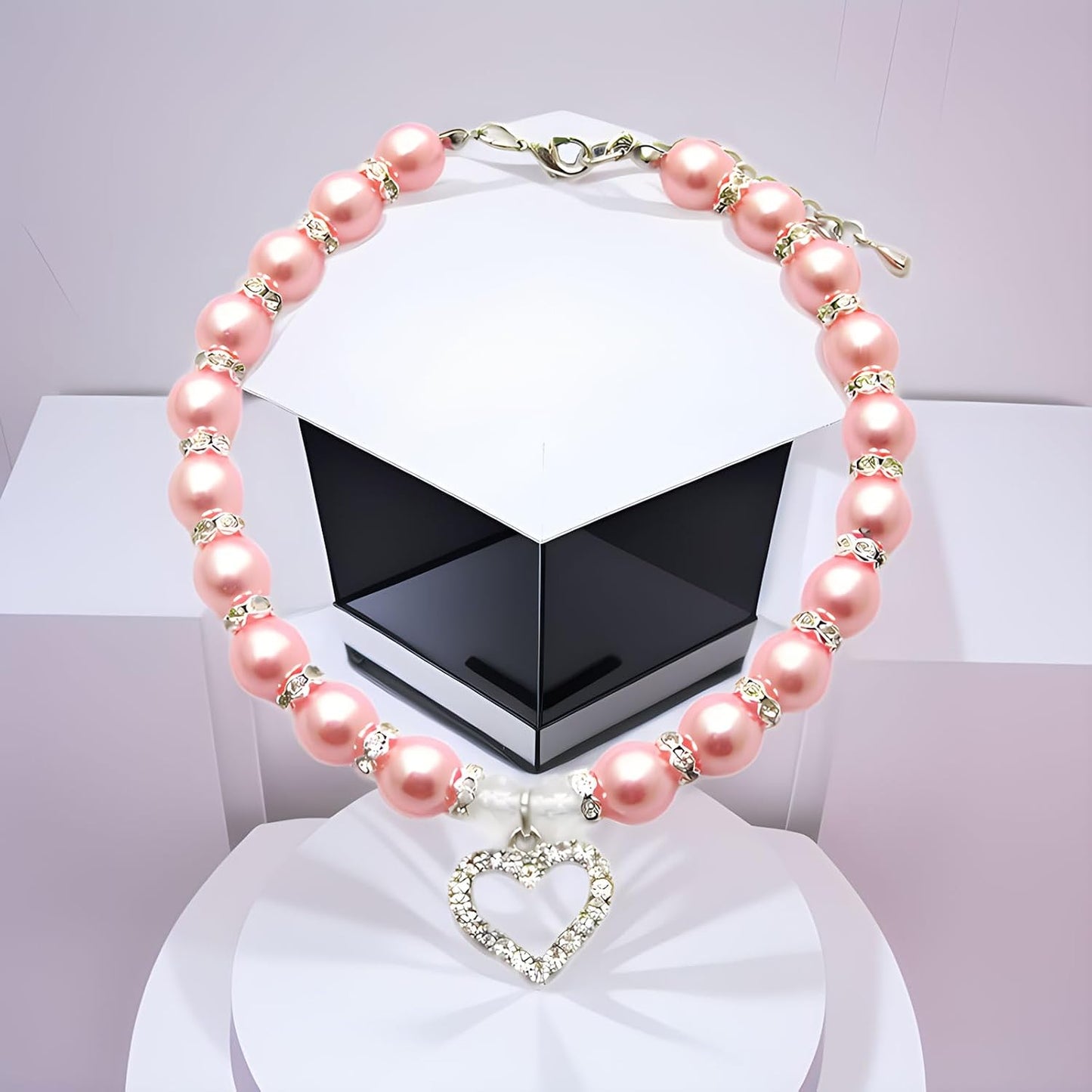 Pink pearl dog collar with rhinestone heart charm pendant close up