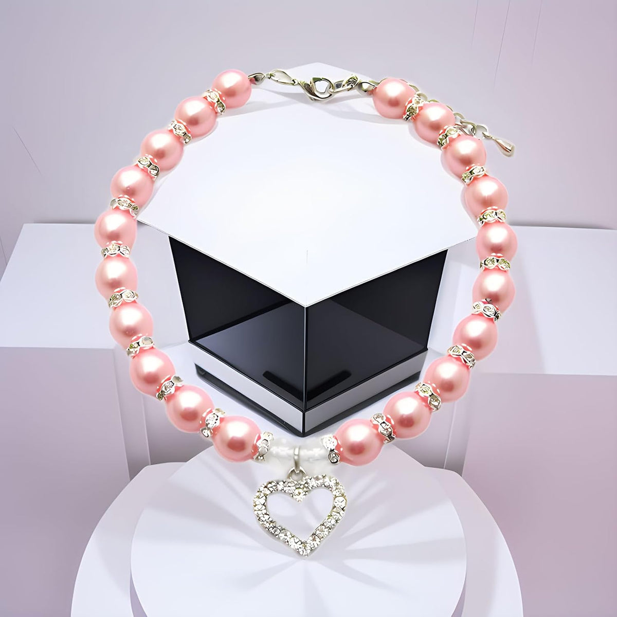 Pink pearl dog collar with rhinestone heart charm pendant close up