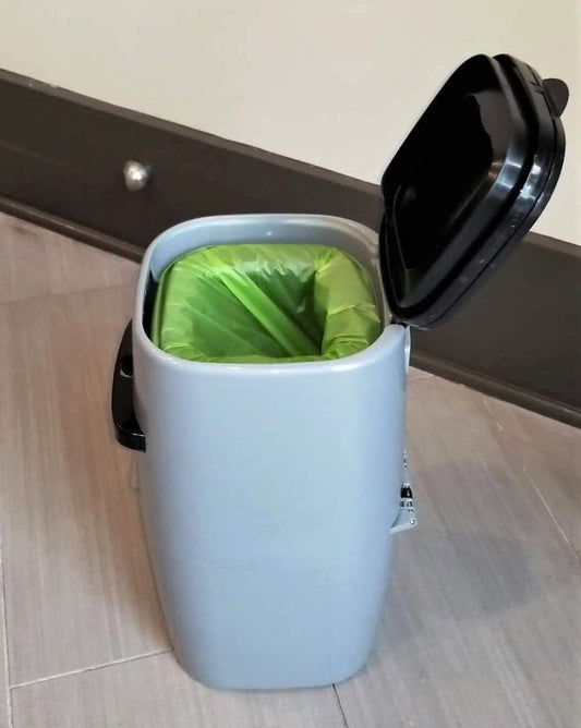 EcoLeo compostable pet disposal roll with twenty seven pre cut green bags displayed clearly.