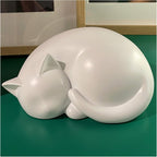AHAILUOO sleeping cat memorial urn white resin front view for pet loss tribute